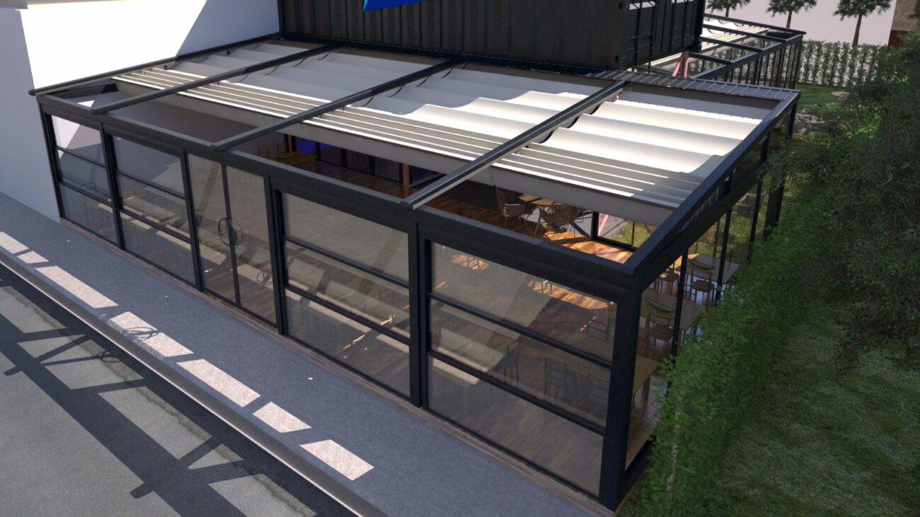 Otomatik giyotin cam sistemleri, dış mekanları dört mevsim kullanılabilir hale getiren motorlu cam sistemleridir. Bu görselde bir kafenin açık alanında uygulanan modern giyotin cam sistemi yer almaktadır.